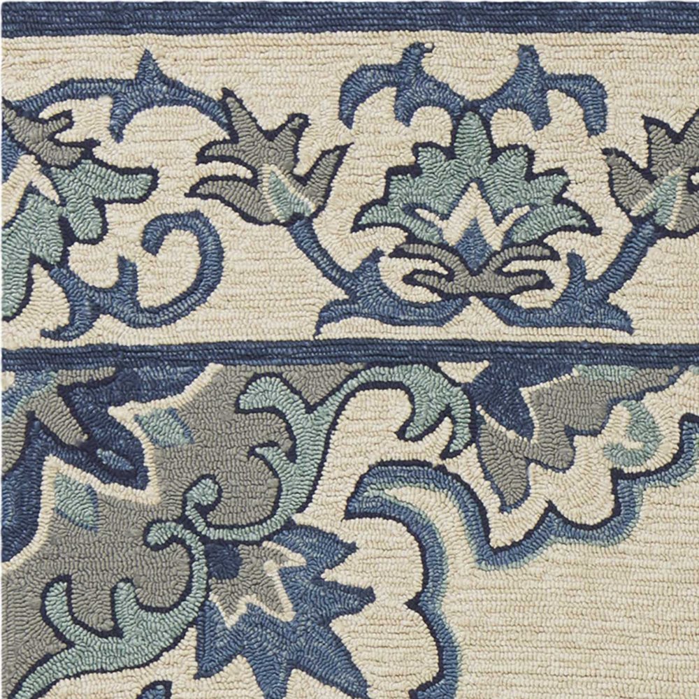 8' X 10' Ivory And Blue Damask Indoor Outdoor Area Rug