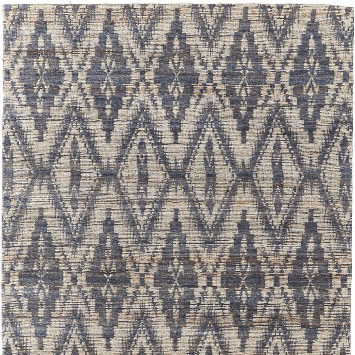 5' X 8' Tan and Gray Geometric Hand Woven Area Rug
