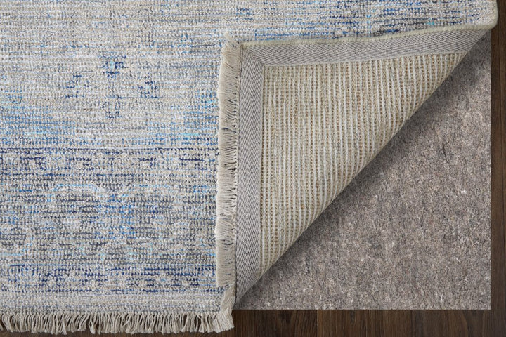 5' X 8' Gray Blue and Ivory Oriental Hand Woven Distressed Area Rug With Fringe