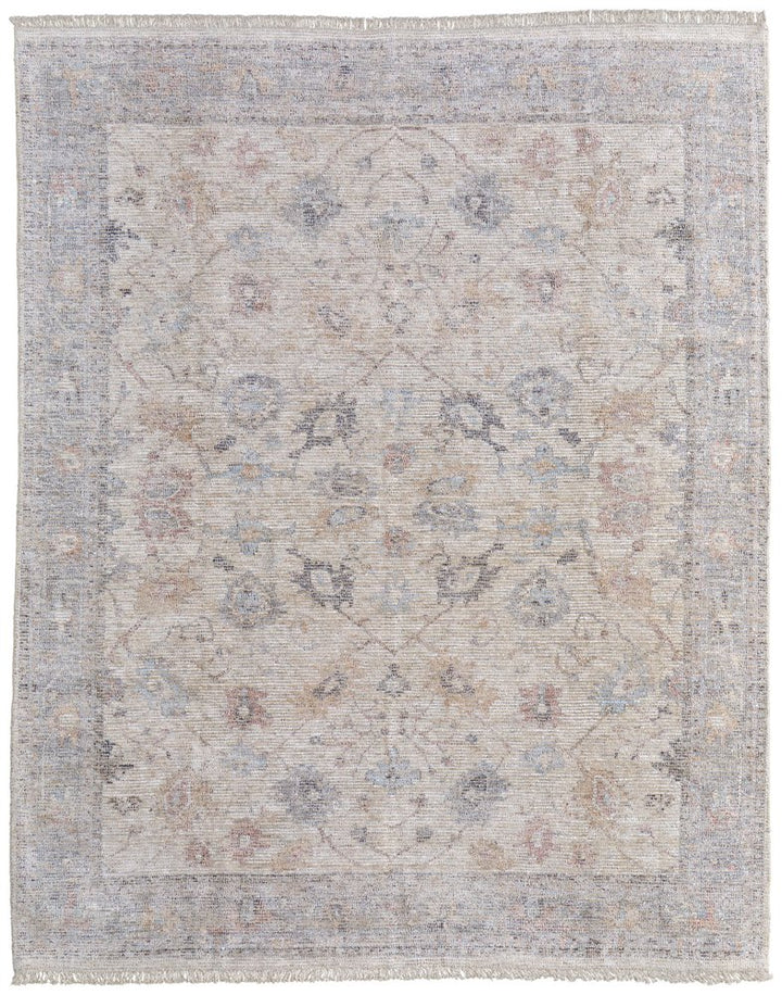 4' X 6' Ivory Tan and Blue Floral Hand Woven Distressed Area Rug With Fringe