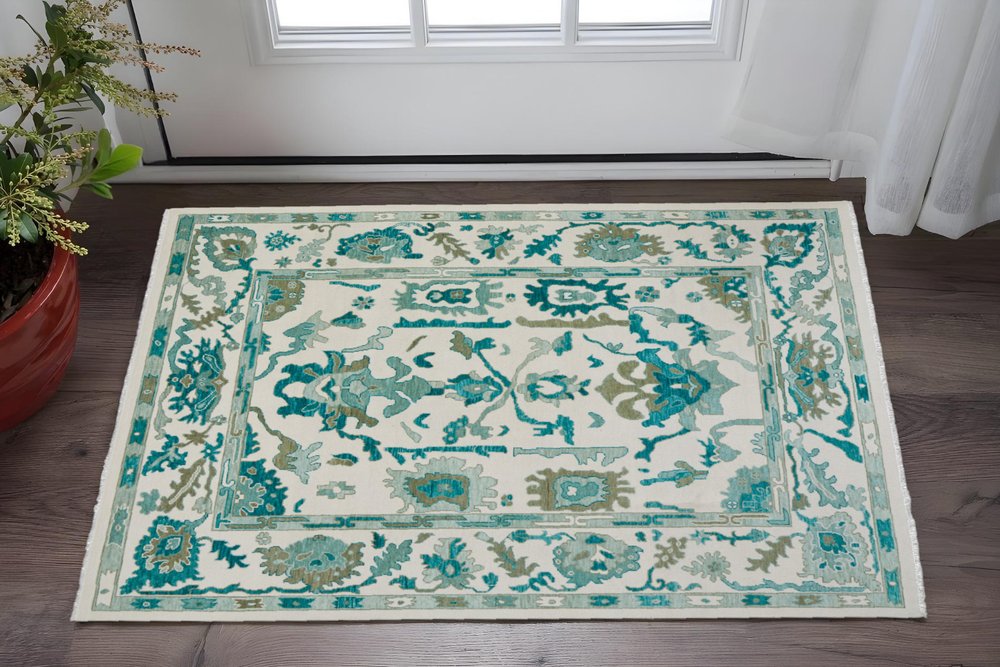 2' X 3' Green and Ivory Wool Floral Hand Knotted Area Rug With Fringe