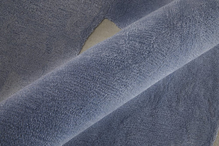 4' X 6' Blue and Ivory Abstract Hand Tufted Area Rug