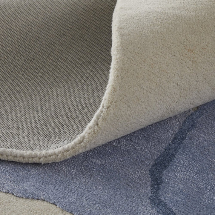 4' X 6' Blue and Ivory Abstract Hand Tufted Area Rug