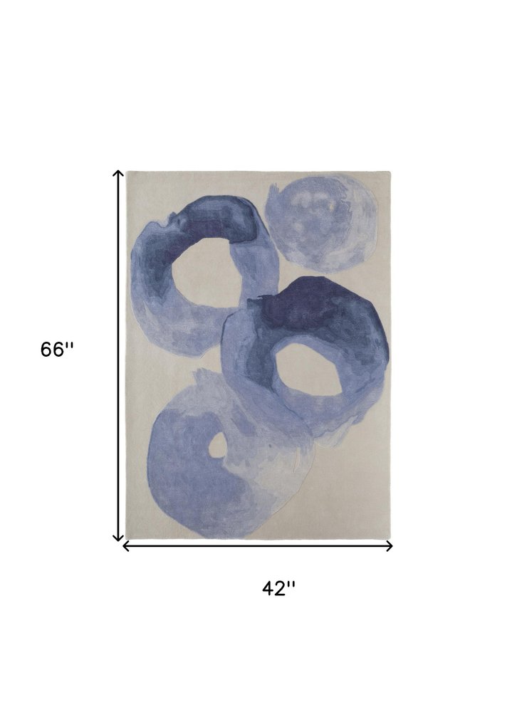 4' X 6' Blue and Ivory Abstract Hand Tufted Area Rug