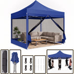 Army green 6-sided pop-up screen gazebo with a sofa set on a backyard patio