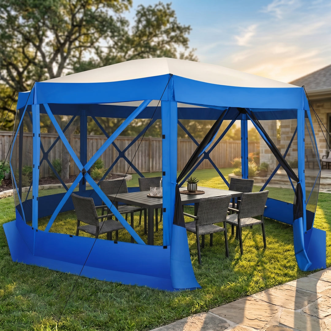 Brown octagonal pop-up screen gazebo set up on a backyard lawn with a dining table and chairs inside