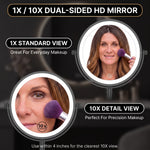 Woman using the 1X and 10X dual-sided magnifying mirror for makeup