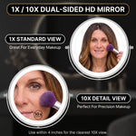 Woman using the 1X and 10X dual-sided magnifying mirror for makeup
