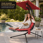 Woman relaxing on a navy chaise lounger with canopy shade beside a pool