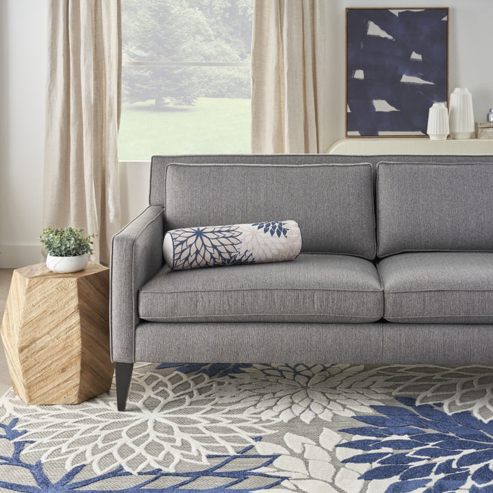 Modern and sophisticated  6" x 20" Beige Blue and Ivory Bolster Floral Indoor Outdoor Throw Pillow