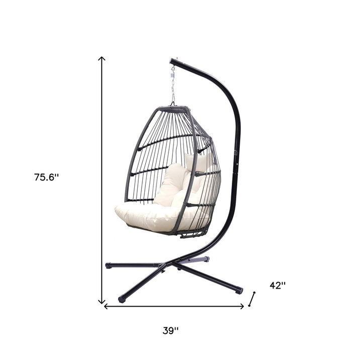 Outdoor Patio Wicker Folding Swing Hammock Egg Chair With Cushion And Pillow, Beige - 330lb Capacity Single Hanging Chair with Steel Stand for Indoor/Outdoor Relaxation