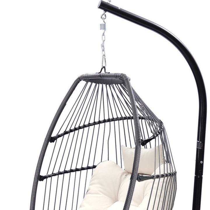 Outdoor Patio Wicker Folding Swing Hammock Egg Chair With Cushion And Pillow, Beige - 330lb Capacity Single Hanging Chair with Steel Stand for Indoor/Outdoor Relaxation