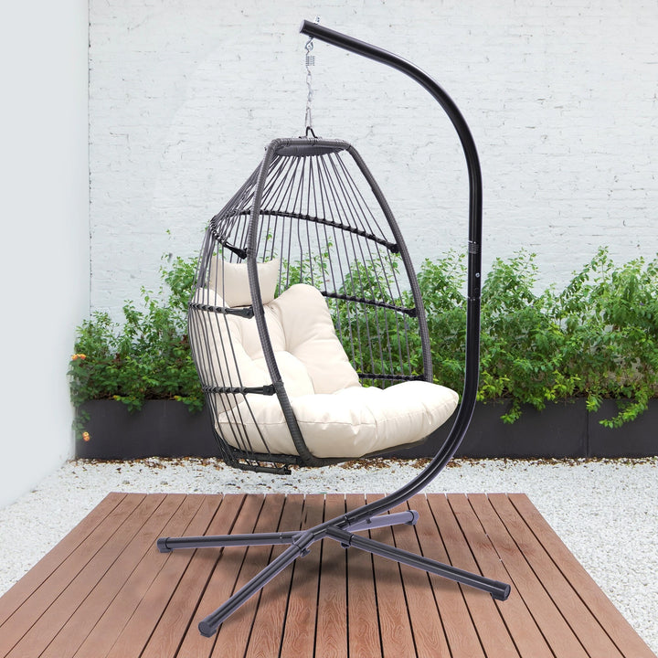Outdoor Patio Wicker Folding Swing Hammock Egg Chair With Cushion And Pillow, Beige - 330lb Capacity Single Hanging Chair with Steel Stand for Indoor/Outdoor Relaxation