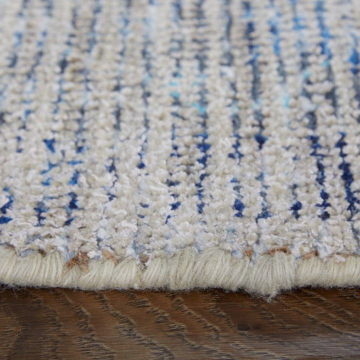 5' X 8' Gray Blue and Ivory Oriental Hand Woven Distressed Area Rug With Fringe