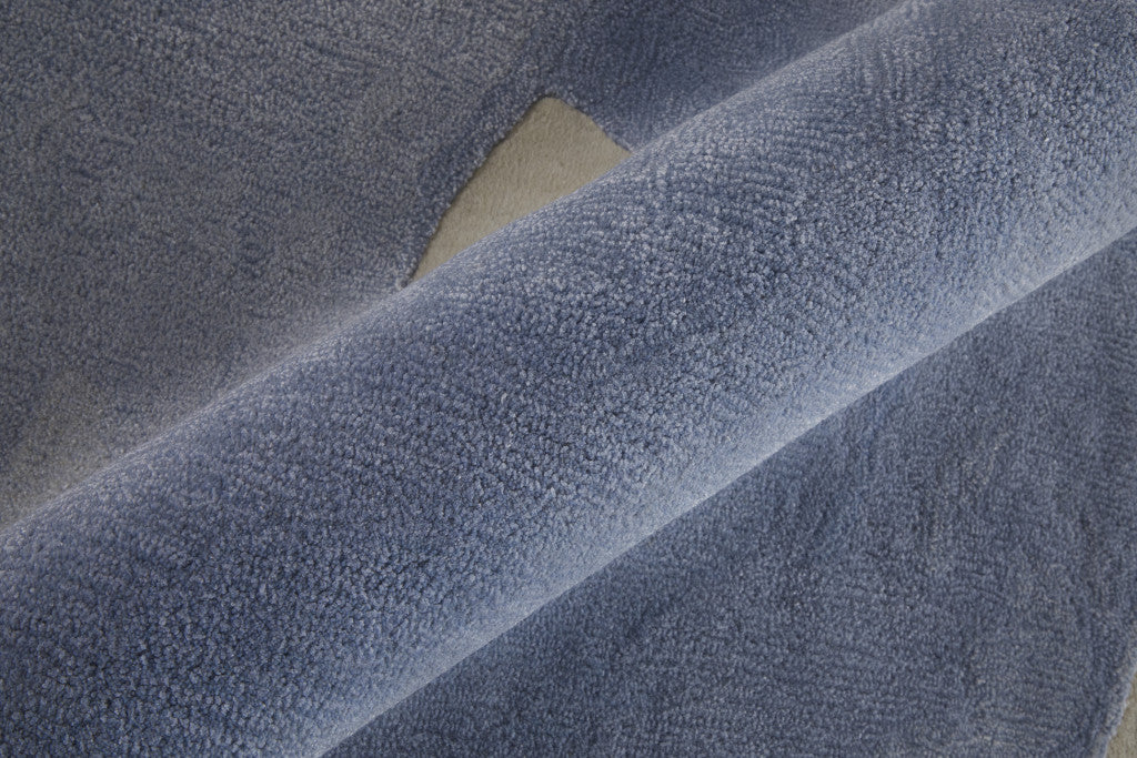 4' X 6' Blue and Ivory Abstract Hand Tufted Area Rug