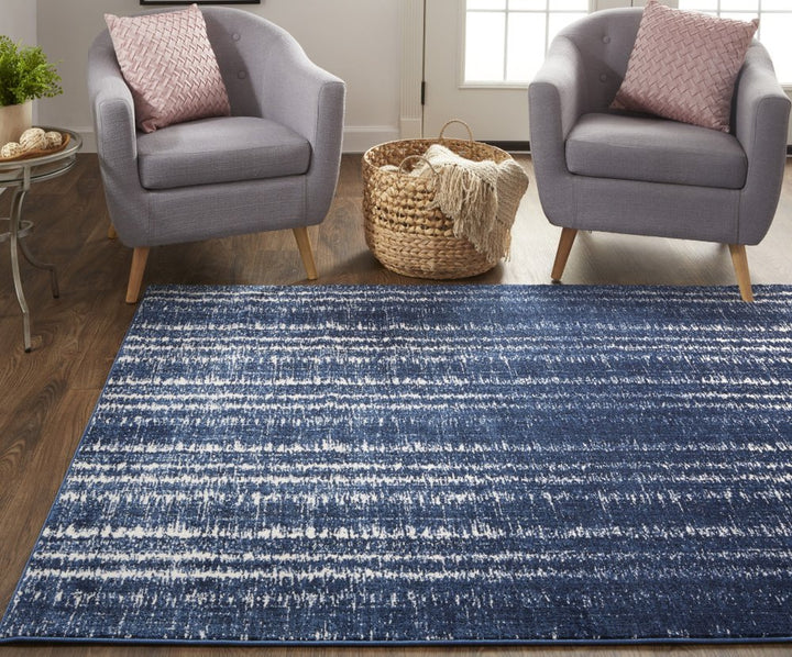 4' X 6' Blue Black and Ivory Power Loom Area Rug