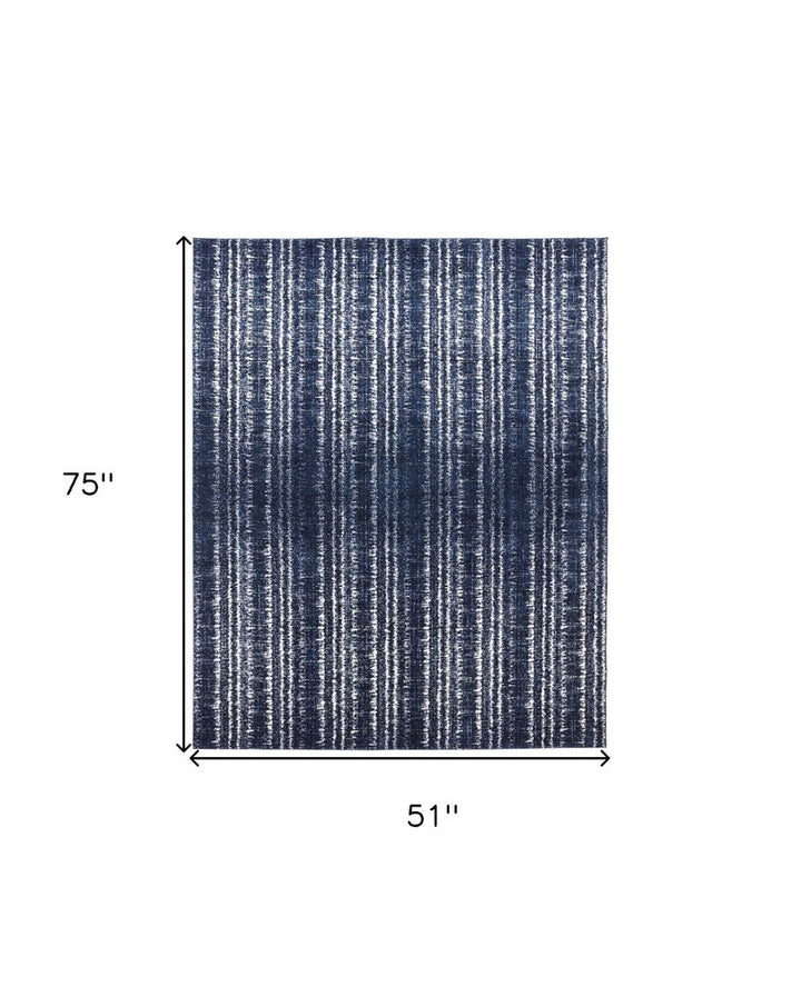 4' X 6' Blue Black and Ivory Power Loom Area Rug