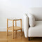 Weslyn Solid Light Brown Wood and Glass Top w/ Cane Side Table