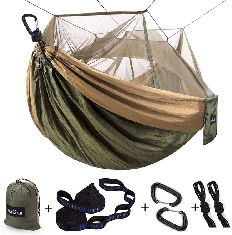 Camping hammock with mosquito net shown with a stuff sack - ground stakes - rope - tree straps and carabiners