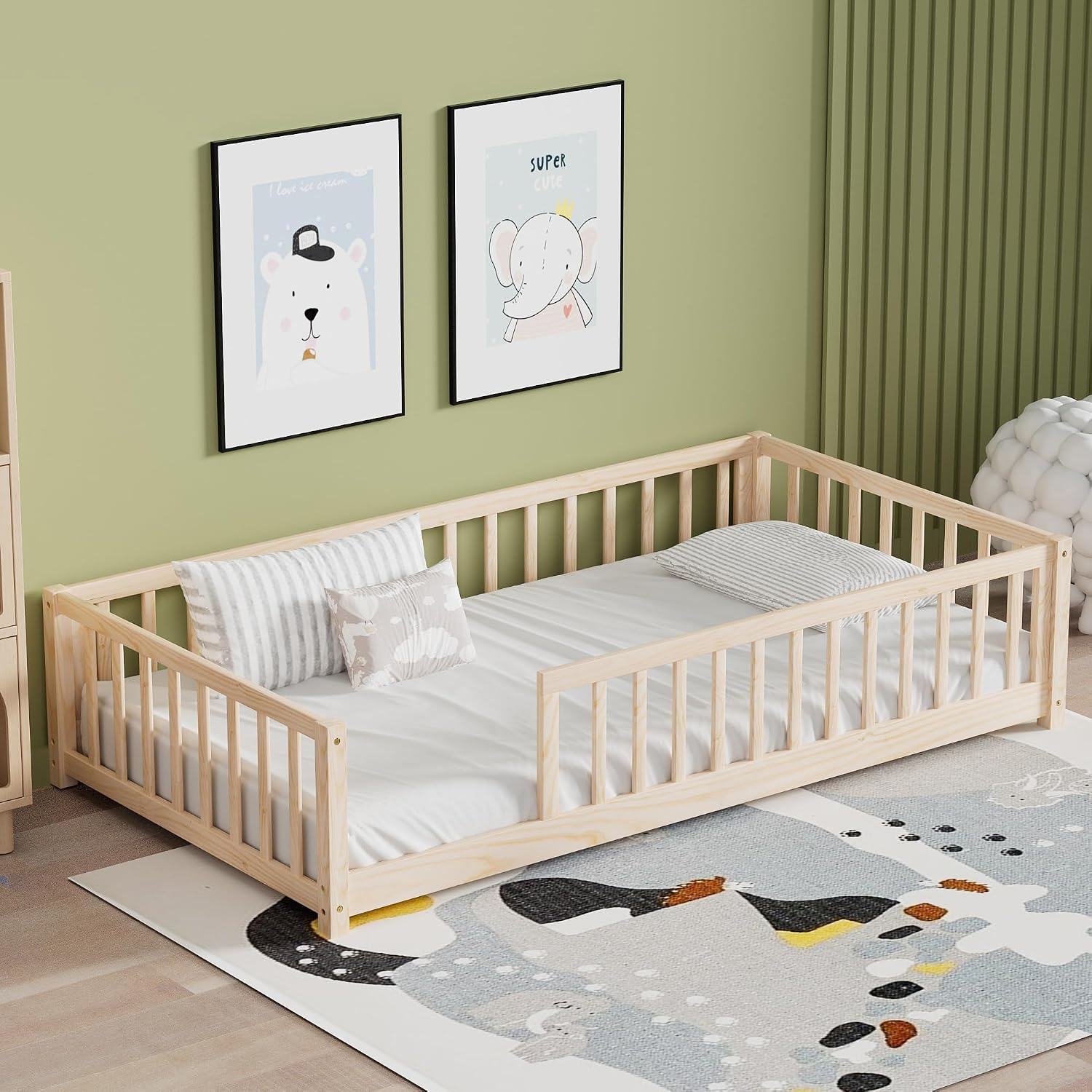 Natural wood Montessori floor bed with fence rails styled in a child's room