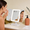 Tri-Fold Lighted Makeup Mirror with 1X/2X/3X Magnification & 64 LED Lights – Rechargeable Vanity Mirror for Dressing Table | Trufairs