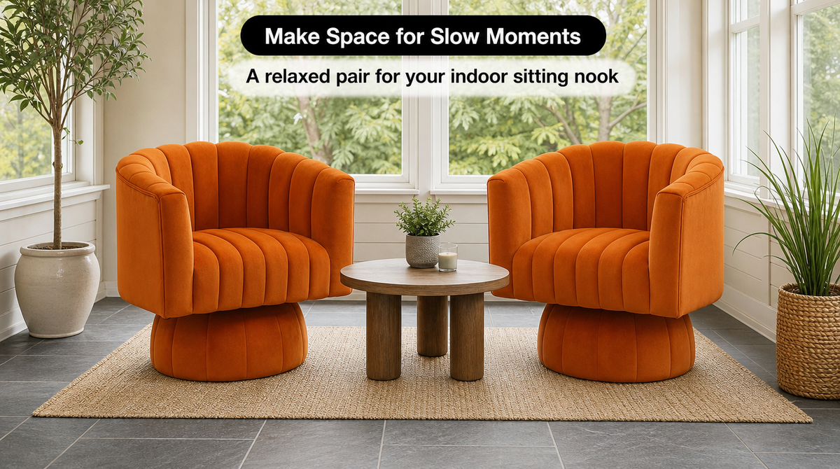 “Two orange swivel accent chairs around a low table in a window-lined sitting nook with indoor plants.”