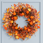 22-inch artificial fall wreath with seasonal autumn foliage and decorative accents