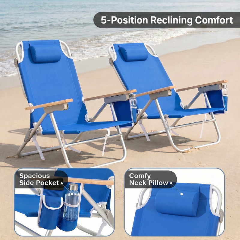 Two reclining backpack beach chairs on the beach highlighting the 5-position recline, the side storage pocket holding keys and a phone, and the padded neck pillow