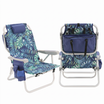 Front and back view of the backpack beach chair in light blue stripe, showing the reclined seat, padded headrest, gray armrests, and buckled backpack straps