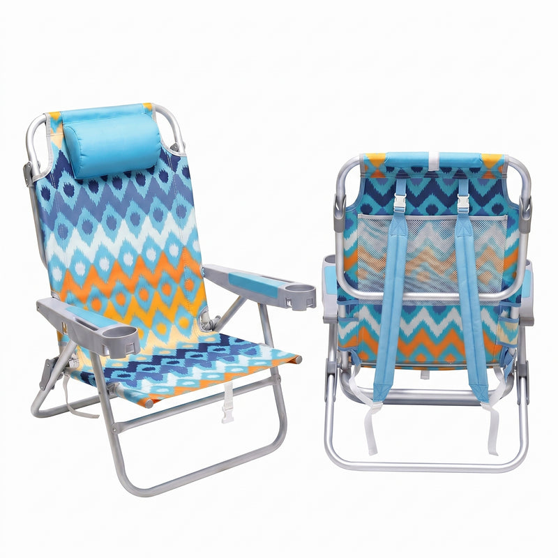 Front and back view of the backpack beach chair in light blue stripe, showing the reclined seat, padded headrest, gray armrests, and buckled backpack straps