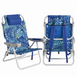 Front and back view of the backpack beach chair in light blue stripe, showing the reclined seat, padded headrest, gray armrests, and buckled backpack straps