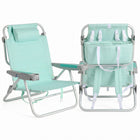 Front and back view of the backpack beach chair in light blue stripe, showing the reclined seat, padded headrest, gray armrests, and buckled backpack straps