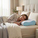 Woman side-sleeping hugging the bamboo memory foam pillow against a dark wood headboard