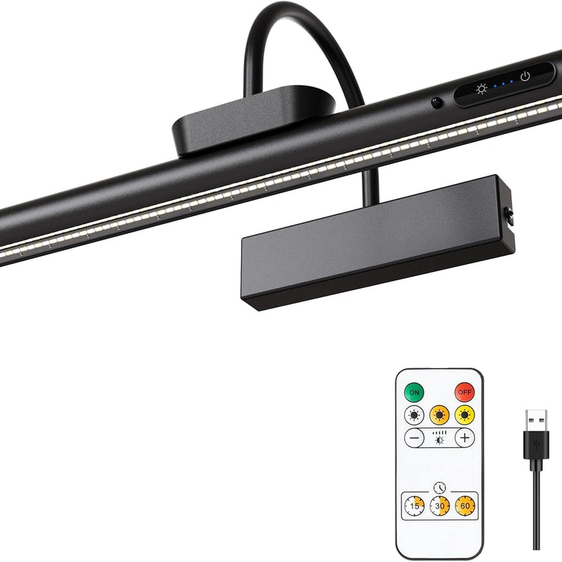 Battery operated picture light on a wall bracket beside the remote control