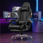 Blue and black big and tall gaming chair with footrest extended in a gaming room