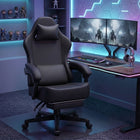 Blue and black big and tall gaming chair with footrest extended in a gaming room