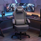 Blue and black big and tall gaming chair with footrest extended in a gaming room