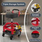 Man adjusting the pneumatic lifting lever under the yellow mechanic stool seat