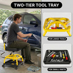 Two-tier tool tray on the yellow mechanic stool holding large tools on top and small parts below