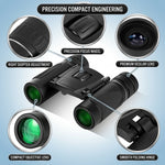 Close-up of 50mm FMC-coated objective lens on high-powered binoculars