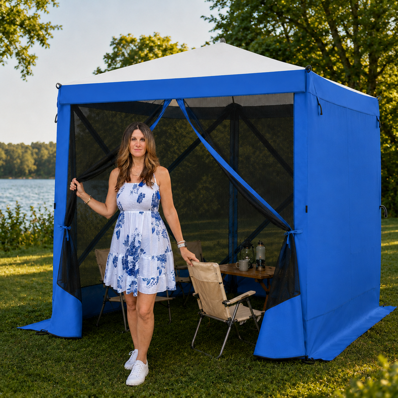 Brown pop-up screen gazebo at a forest lakeside campsite with two people seated at a table inside