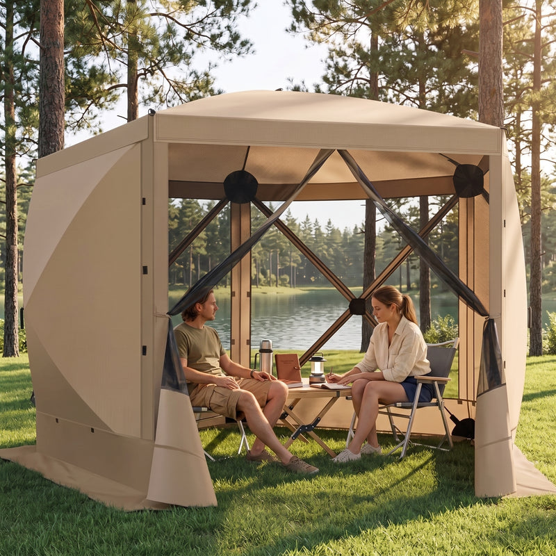 Brown pop-up screen gazebo at a forest lakeside campsite with two people seated at a table inside