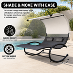 Navy chaise lounger with canopy showing its relaxed reclining shape