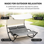 Navy chaise lounger with canopy showing its relaxed reclining shape