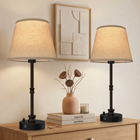 Black cordless rechargeable table lamp with linen fabric shade, lit