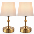 Black cordless rechargeable table lamp with linen fabric shade, lit