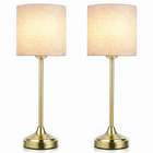 Black cordless rechargeable table lamp with linen fabric shade, lit