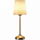 Black cordless rechargeable table lamp with linen fabric shade, lit