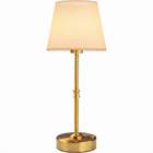 Black cordless rechargeable table lamp with linen fabric shade, lit