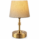 Black cordless rechargeable table lamp with linen fabric shade, lit